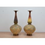 Two Doulton onion vases, marked to the bases, 43cm high, of slightly differing designs (2)