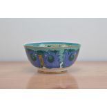A Wedgwood 'Chou Dynasty' bone china bowl, designed by Susie Cooper, printed externally and