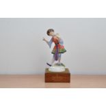 A limited edition Royal Doulton ceramic figurine of the Chinese Dancer, from the Dancers of the