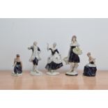 Five Royal Dux figurines, comprising a dancing lady and gentleman, t wo seated women and a flower