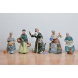 Five Royal Doulton ceramic figurines, comprising, Embroidering H.N. 2855, The Orange Lady, Christmas