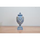 A Wedgwood Jasperware 'Royal Wedding' urn, limited edition, no. 50 of 100 in gold on the base,