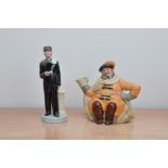 Two Royal Doulton ceramic figurines, comprising, Ritz Bell Boy H.N. 2772, together with its