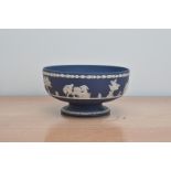 A 1970's Wedgwood Jasperware footed bowl, with classical decoration, impressed marks to the base for