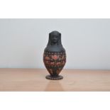 A Wedgwood Jasperware Canopic vase, terracotta and black design, impressed marks to the bass for