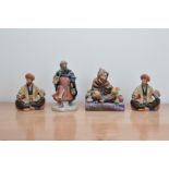 Four Royal Doulton ceramic figurines, comprising, two figurines of Omar Khayyam H.N. 2247, Good King