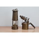 A brass miners lamp, by E. Thomas & Williams of Aberdare, 26cm high, together with a Swedish brass