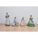 Four 20th century hand painted porcelain bisque figures, from the little women collection,