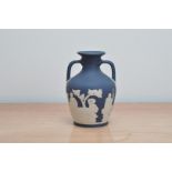 A 20th century Wedgwood Jasperware Portland Vase, twin handled, impressed marks for 1972 to the