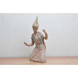 A large Lladro Thai figure, of a kneeling girl, 43cm H