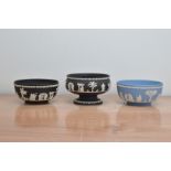 Three 20th century Wedgwood Jasperware bowls, comprising and black and white footed bowl 12cm H x