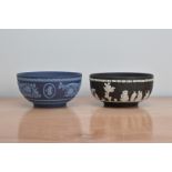 Two 20th century Wedgwood Jasperware bowls, one two tone blue 20cm W, the other black and white 19.