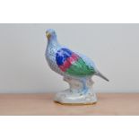 A large porcelain Herend partridge, marked to the underside, 23cm high