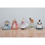 Five Royal Doulton ceramic figurines, comprising, Pensive Moments H.N. 2704 (cracked to the base,