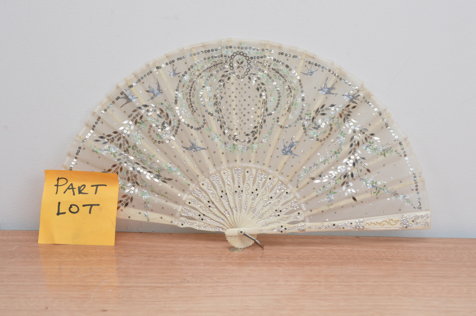 Three early 20th century fans, comprising an art deco example, with gold decoration and hand painted - Image 4 of 4