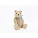 A 1950s Hermann teddy bear, with beige mohair, clear and black glass eyes with brown backs,