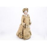 A large early unmarked Jumeau pressed bisque fashionable doll, with deep blue striated glass eyes,