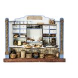 A French late 19th Century Cremerie shop, painted light blue and blue wood with ornate gilt