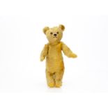 A British United Toy Manufacturing Co Ltd Omega pyjama case teddy bear 1930s, with golden mohair,