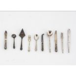 Modern dolls' house white metal cutlery, matching set comprising three sugar sifting spoons, cake