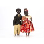 A early 20th century Brazilian Bahia cloth black couple, the man with black stitched eyes, eyebrows,