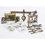 Dolls’ house chattels, a German Penny Toy treadle sewing machine —3in. (7.5cm.) high; a Foreign