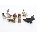 Forest Toy of Brockenhurst cat and three dogs, a rare prowling tabby cat --1¾in. (4.5cm.) long (