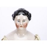 A rare mid 19th century china shouder-head lady doll, possibly Kister with pink flesh tone, blue