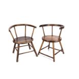Two similar early 20th century child's chairs, the circular seat with bent continous back and arm