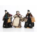 Three amusing artist doll Victorian ladies, two bag ladies and a home produce seller with painted