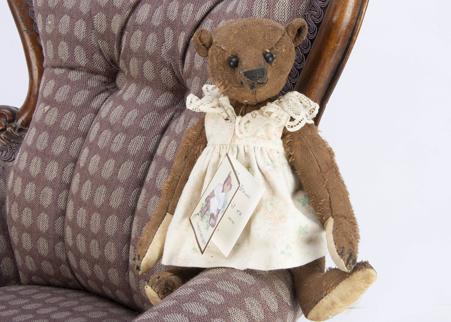 A small Forget Me Not Bessie Brown teddy bear, 1 of 1 with card tag April 2002 , artifically