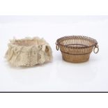 Two small 19th century circular baskets, with handles, one with pink glazed muslin and lace