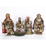 Four second half of the 20th century pedlar dolls, a lady under glass dome of brass base --11¾in. (