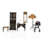 A rare group of Westacre Chinoiserie black lacquered dolls’ house furniture, wood and papier-mâché