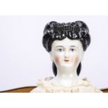 A German china shoulder-head lady doll with elaborate hairstyle, probably by Conta & Boehme with