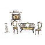 A small scale soft metal sofa and chairs, by a ‘flat’s manufacturer with ornate decoration —3in. (