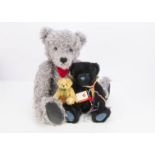 Three Hermann Teddy bears, a large November teddy bear 28 of 200, with card tag --23½in. (59.9cm)