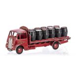 A Timpo Toys AEC Monarch Brewery Lorry, red body, flatbed and hubs, 'VAUX' cast on headboard