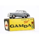 A Gamda Transport Toys Series Daimler Conquest, two-tone grey body, dark grey base, spun hubs,