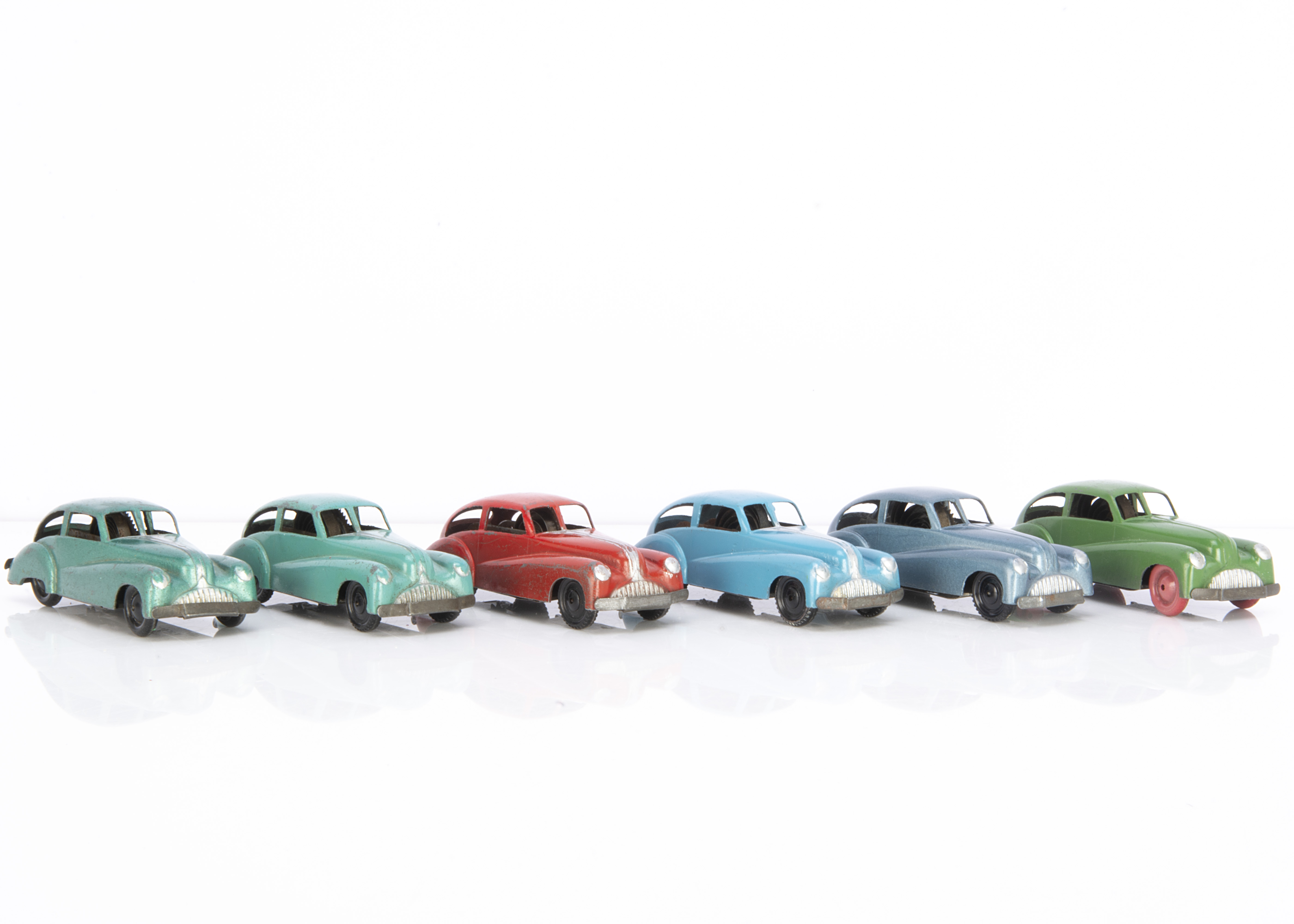 Brimtoy Pocketoy Clockwork No.505 Buick Coupe, six examples, turquoise, red, light blue, metallic