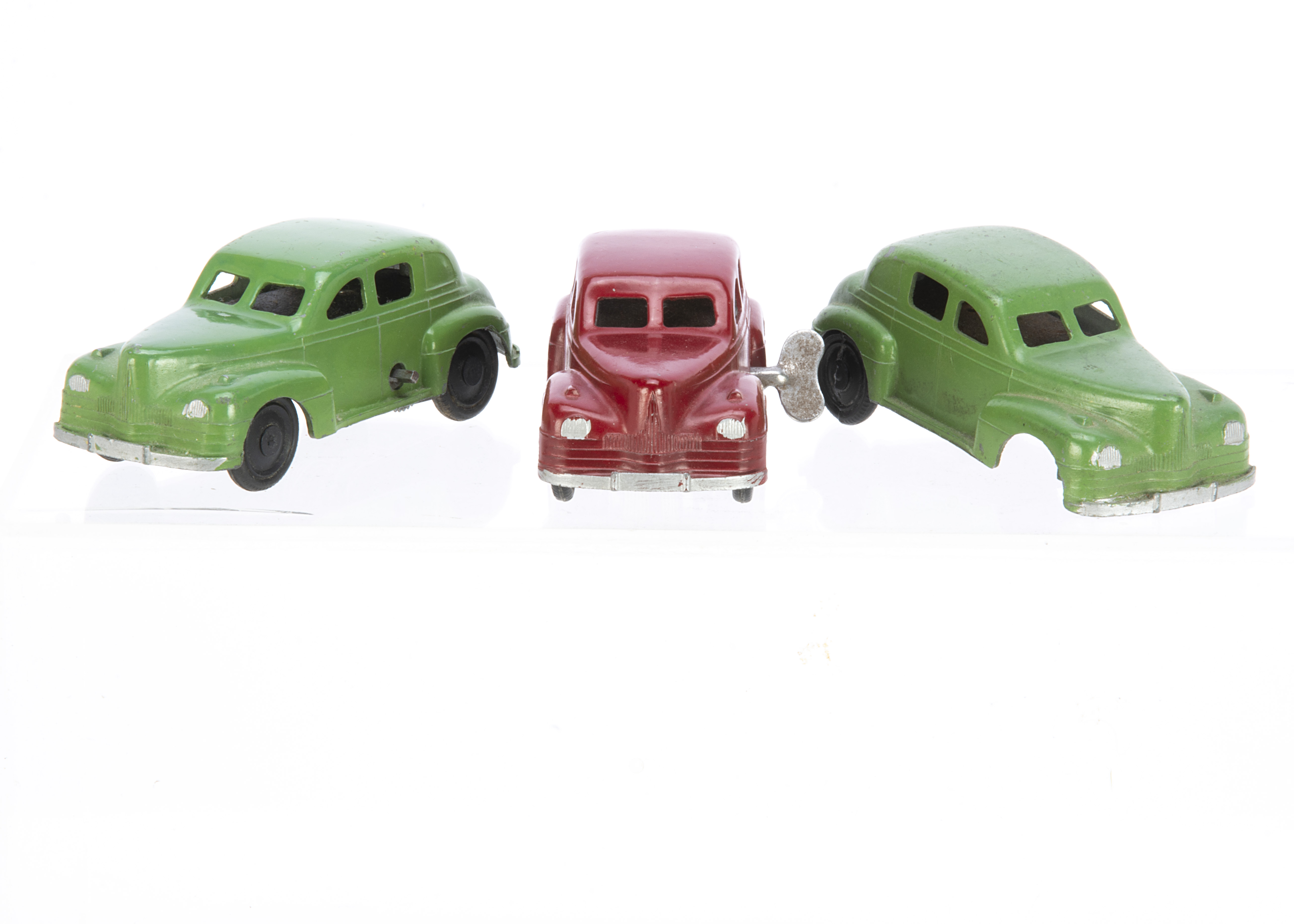 Robin Hood TP Series Saloon Car, three examples, all with clockwork motors, dark red, green (2), F-