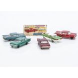 Maxwell Toys No.558 Impala, five examples, red, teal green, metallic red, metallic aqua, in original