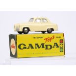 A Gamda Transport Toys Series Ford Prefect, cream body, grey base, spun hubs, numberplate 35-074, in