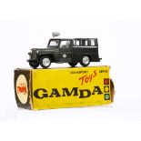 A Gamda Transport Toys Series Willys Jeep Estate Police, dark green body, white roof, silver plastic