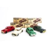 Penguin Series 4 Plastic Rubber Band Drive Ford V8 Tudor Sedan, four examples, red, cream, dark