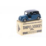 A Timpo Toys London Taxi, dark blue lower body, black upper and roof, silver trim, bare metal