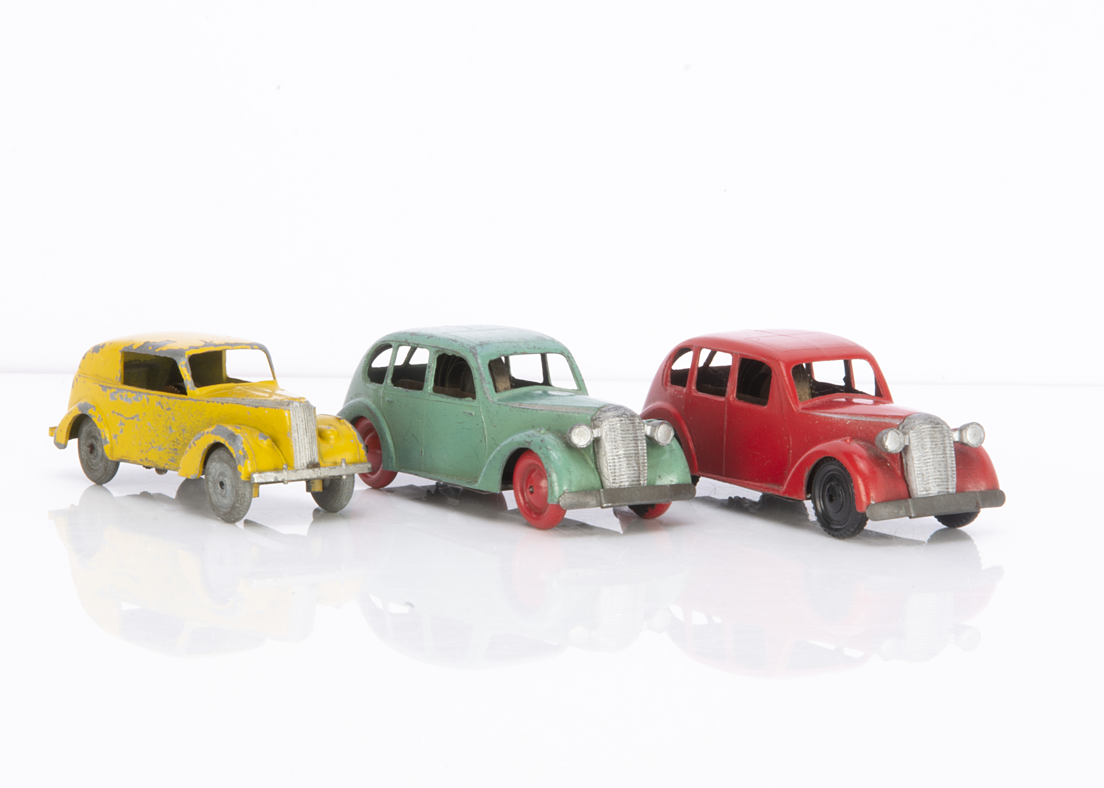 Brimtoy Pocketoy Clockwork Cars, 1939 Vauxhall Saloon (2), red with black plastic hubs, green with