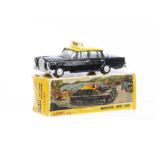 A Nicky Toys 051 Mercedes-Benz 220 SE Taxi, black body, yellow roof, 'Taxi' roof sign, grey