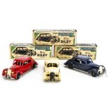 Penguin Series 4 Plastic Rubber Band Drive Riley Saloon, three examples, cream, red, dark blue, in