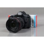 A Canon EOS 5D DSLR Camera, powers up, shutter working, appears to function as as should, body G,